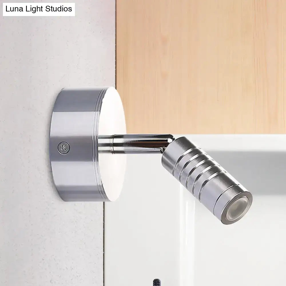 Modern chrome mini tubed wall lamp with adjustable spotlight head and ribbed texture for white warm bathroom lighting