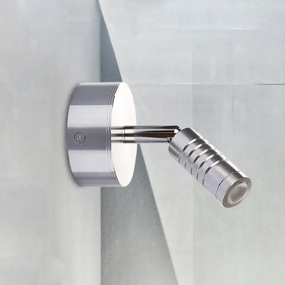 Modern chrome mini tubed wall lamp with adjustable cylindrical head and ribbed texture for white warm bathroom lighting