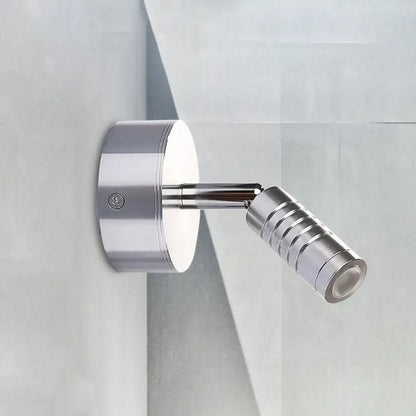 Modern chrome mini tubed wall lamp with adjustable cylindrical head and ribbed texture for white warm bathroom lighting