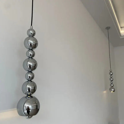 Modern chrome multi ball pendant light source with polished spherical beads for bedroom hanging lamp lighting