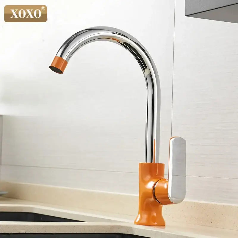 Modern chrome and orange single handle kitchen faucet mixer tap with vibrant base and spout accent by decorbites brass single
