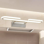 Modern chrome paper clip vanity light fixture with sleek curved white acrylic panels for bathroom use