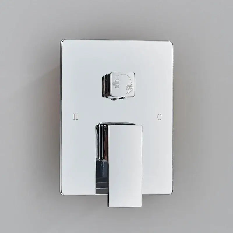 Modern chrome shower faucet with sleek rectangular wall-mounted mixer and dual control knobs for hot and cold water