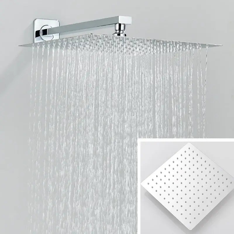 Modern chrome rainfall shower faucet system with rectangular showerhead featuring multiple water jets and sleek design