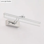 Modern chrome rectangle wall vanity light with sleek design and textured glass diffuser for bathroom use
