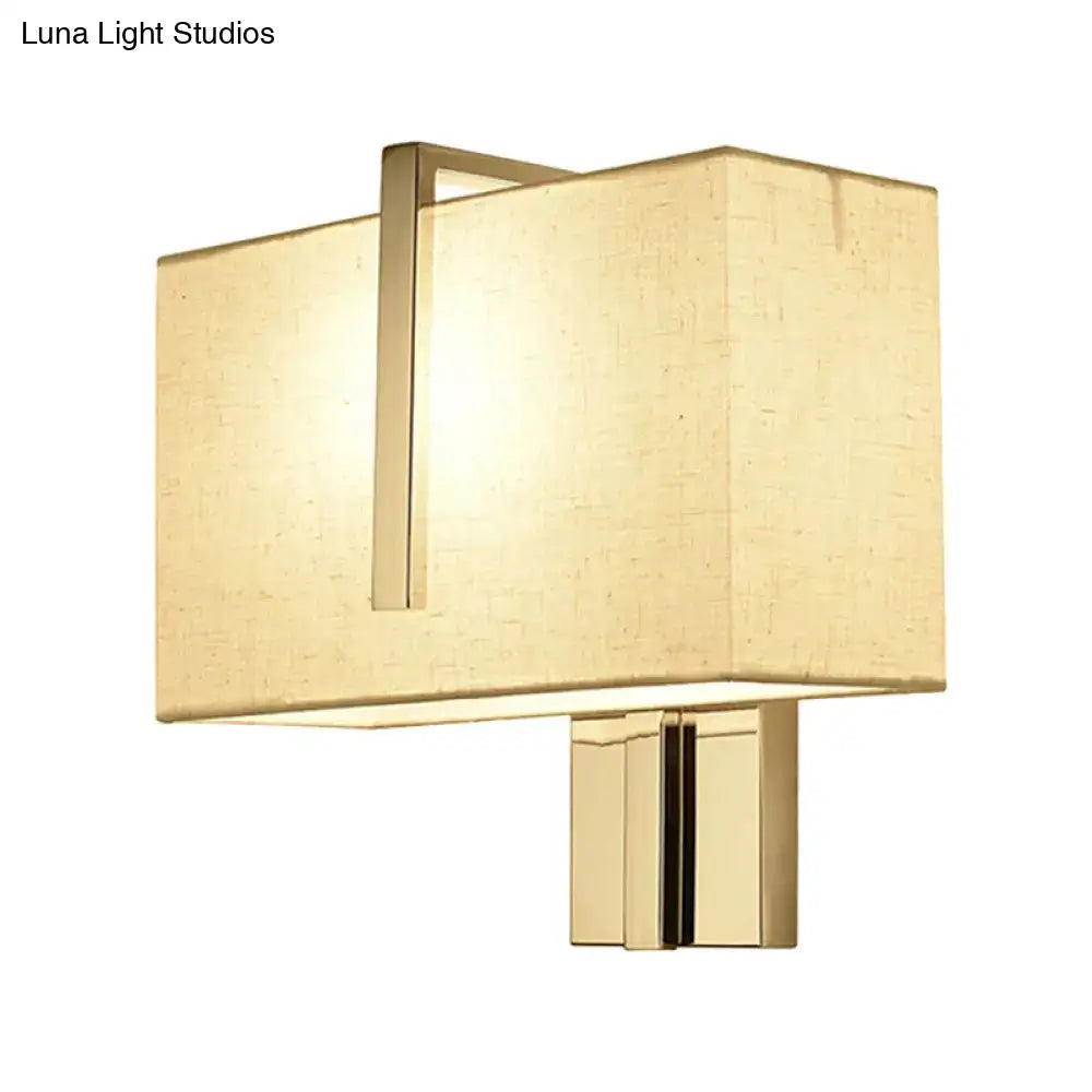 Modern gold-finished wall sconce with rectangular textured beige fabric shade and chrome frame compatible with e26 e27 bulbs