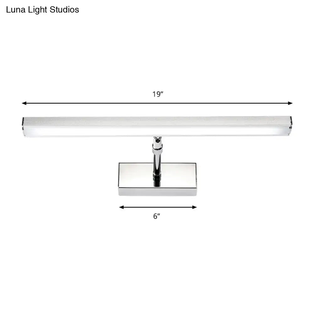 A sleek modern 19-inch chrome wall light with rectangular diffuser and minimalist design for bedroom use