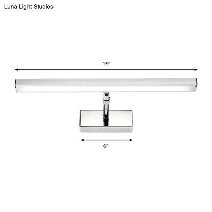 A sleek modern 19-inch chrome wall light with rectangular diffuser and minimalist design for bedroom use