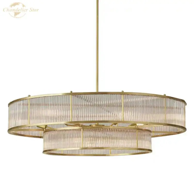 Brass-finished double-tier glass chandelier with clear ribbed panels for modern dining room decorbites glass chandeliers