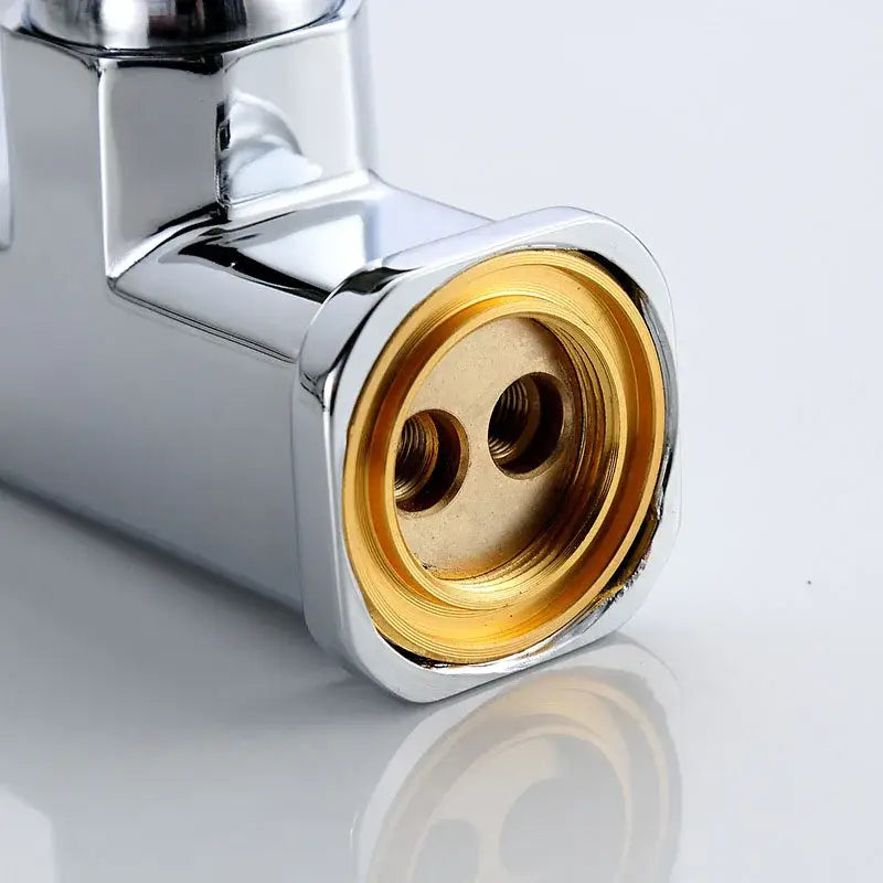 Modern chrome rotating spout faucet adapter showing brass threaded interior and two screw holes on the back side
