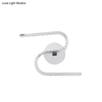 Modern chrome s-shape led wall sconce with sleek curved design, acrylic shade, and warm white light for bedroom use