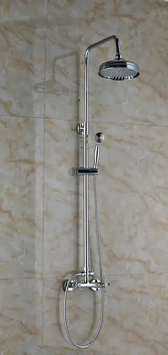 Modern chrome shower mixer faucet set with circular rainhead and handheld spray nozzle for bathroom use