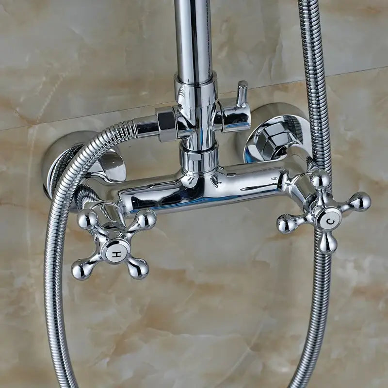 Modern chrome shower mixer faucet set with handshower featuring a sleek chrome faucet with cross handles marked h and c