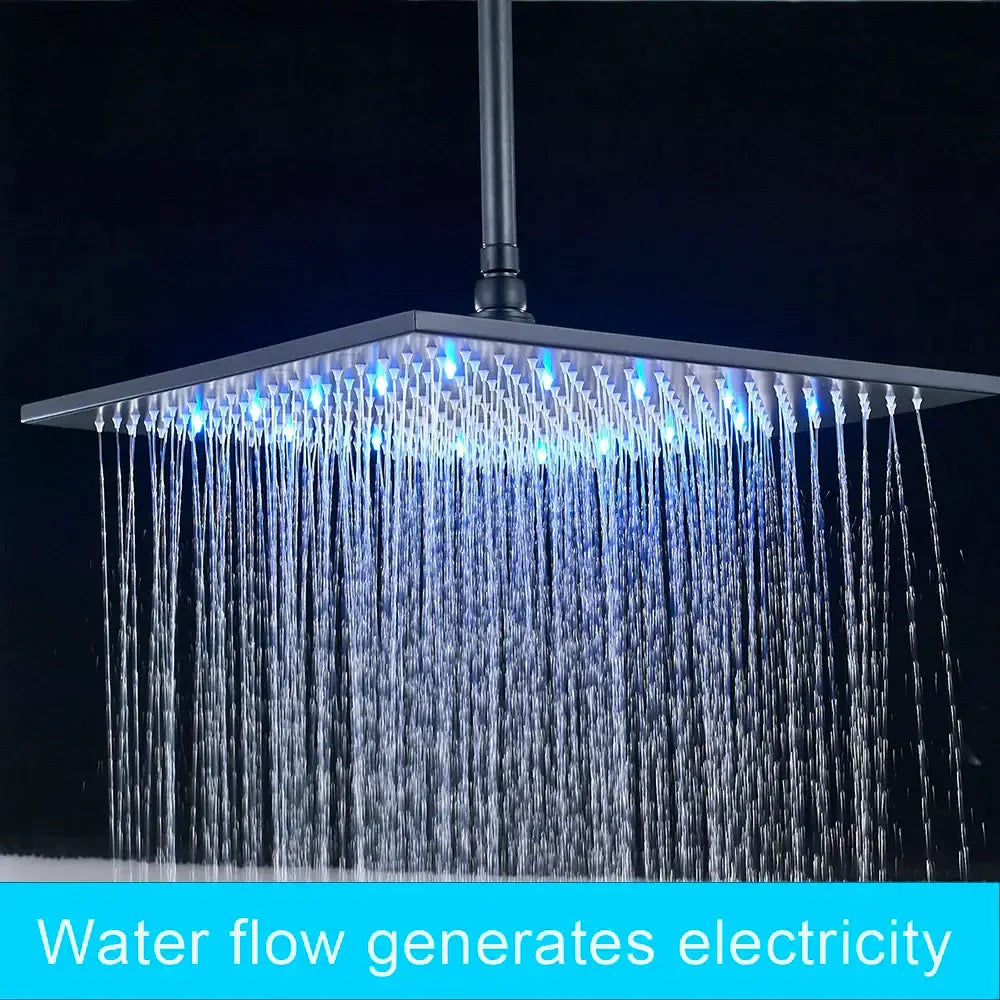 Modern chrome square led rainfall shower head with black finish and blue led lights emitting cascading water flow