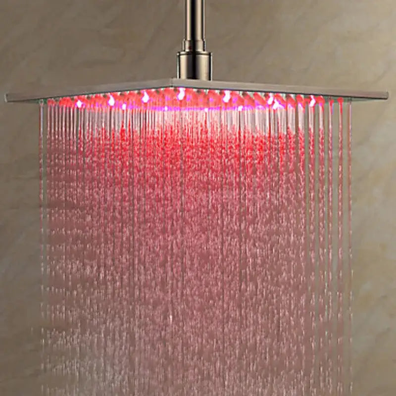 Modern chrome square rainfall shower head with brushed nickel finish and integrated red square led light edges