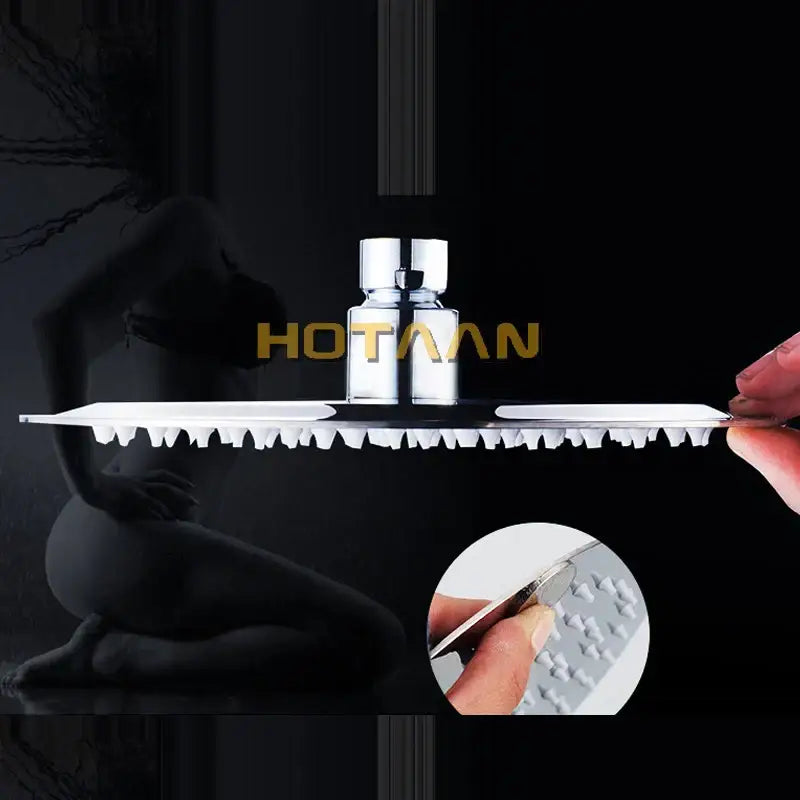 Silver-toned serrated-edge kitchen knife with textured grip and sharp blade beside modern chrome rain shower head