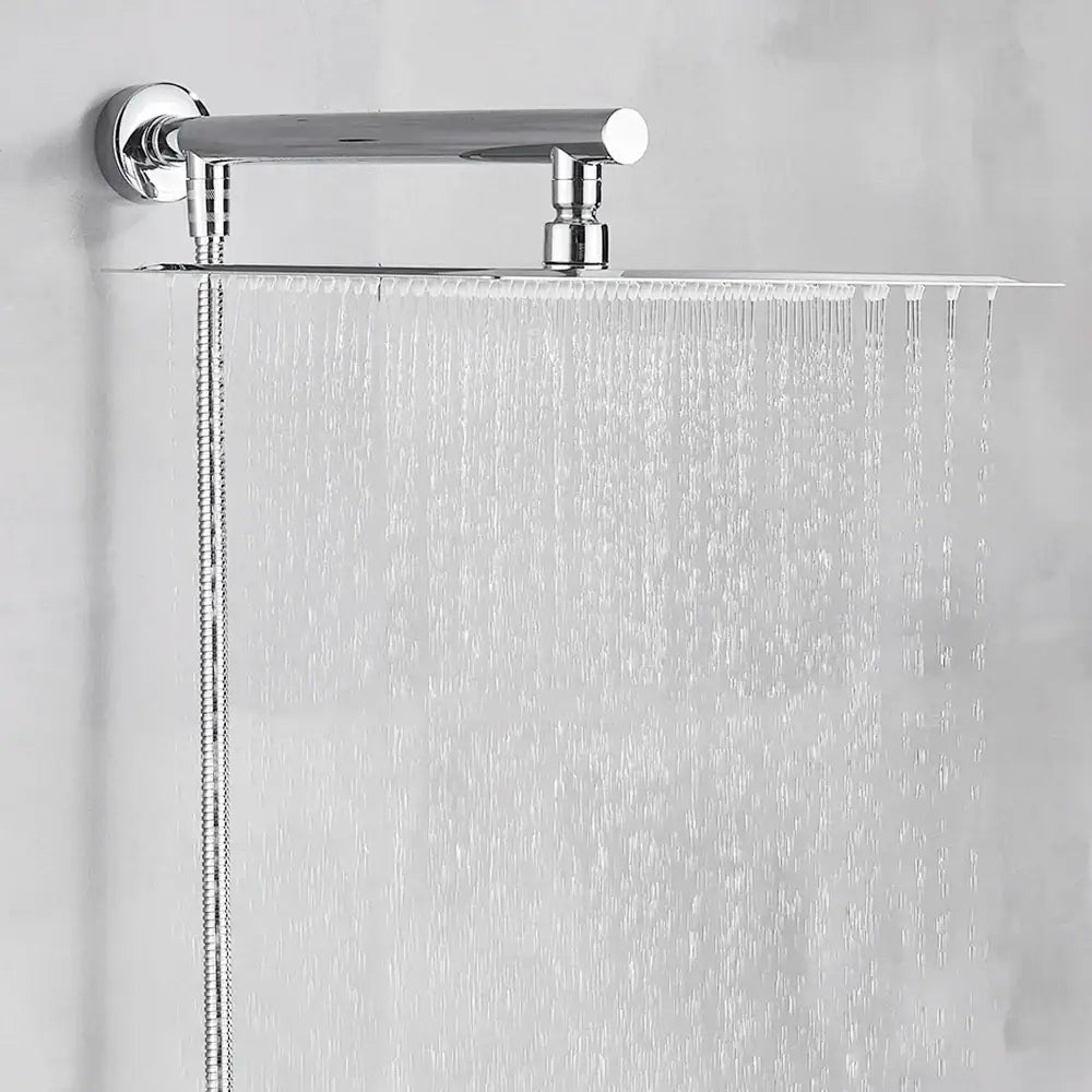 Modern chrome square rainfall shower head set with rectangular chrome-finished head and adjustable wall-mounted bar