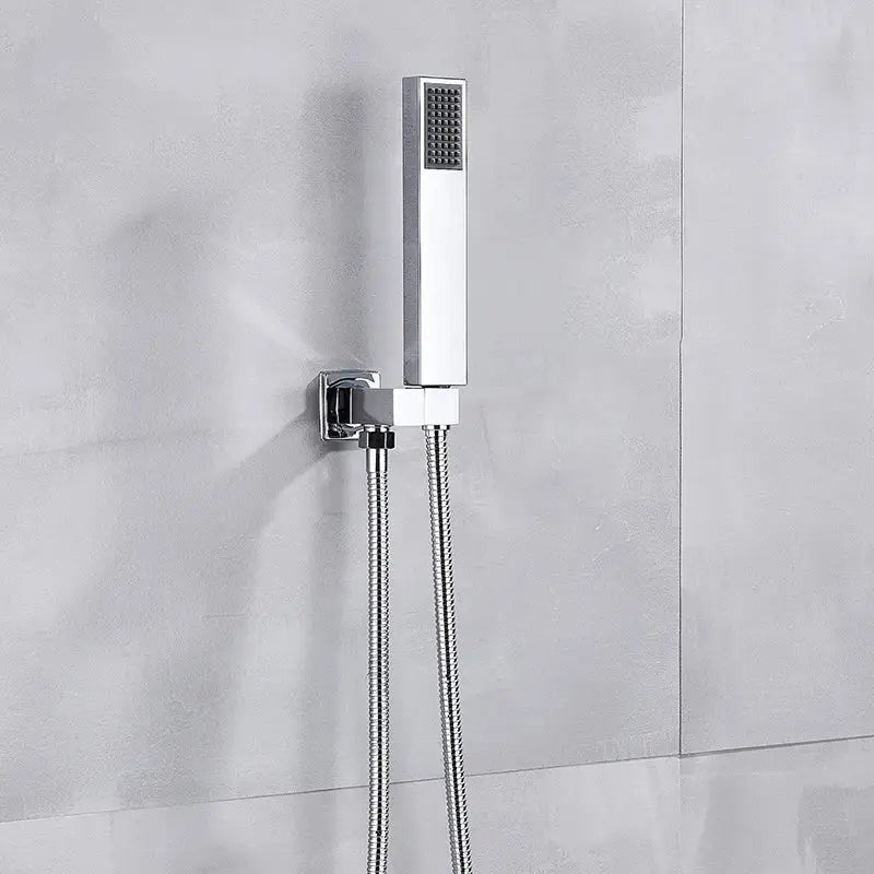 Modern chrome square shower faucet set with a rectangular chrome-finished rain showerhead and flexible braided hose