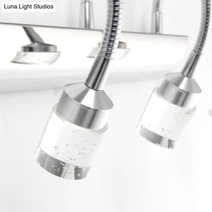 DecorBites™ DecorBites™ Modern Chrome Swoop Arm LED Vanity Wall Sconce with Seedy Crystal for Stylish Bath Decor