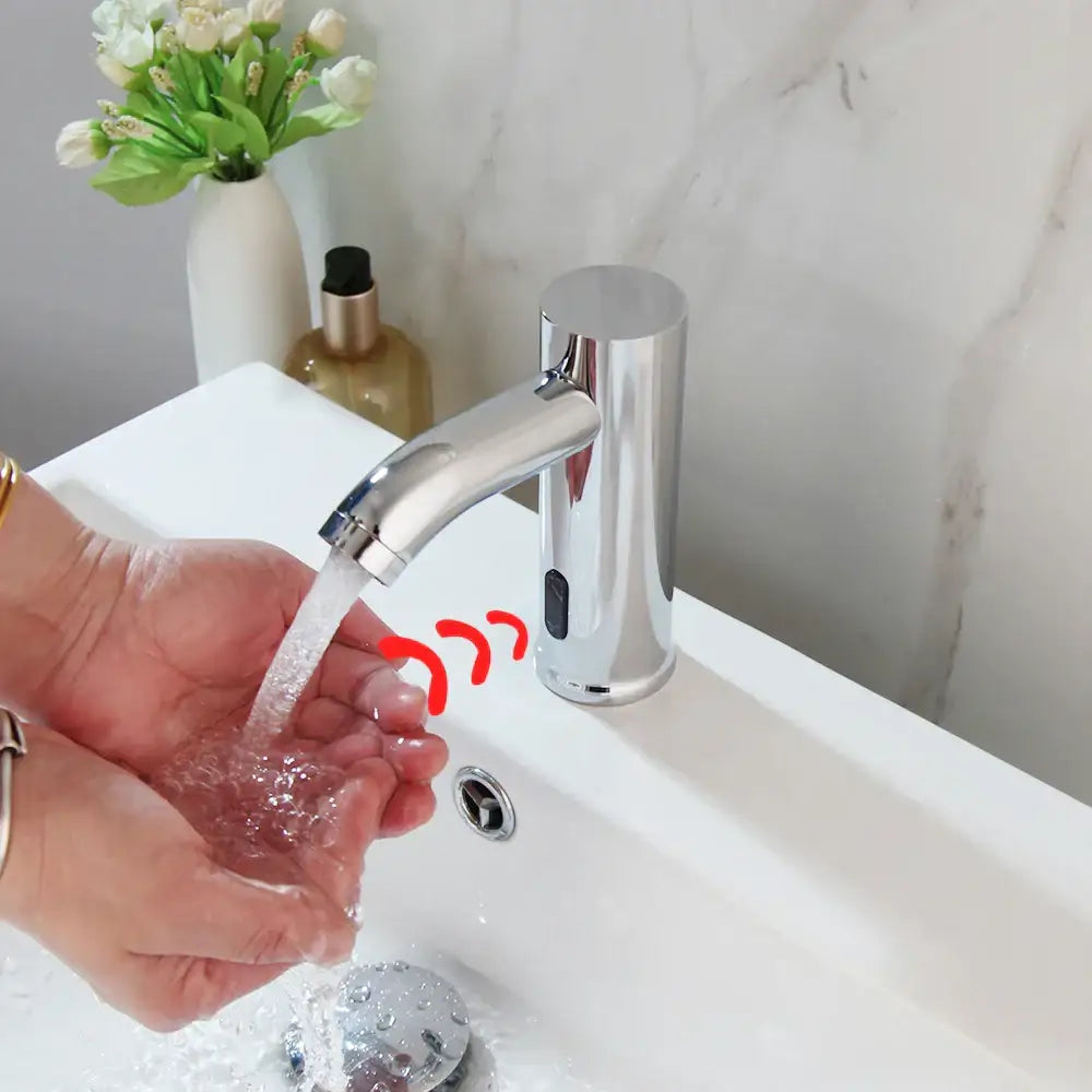 Modern chrome touch sensor basin faucet with sleek cylindrical body and automatic touch sensor for bathroom use