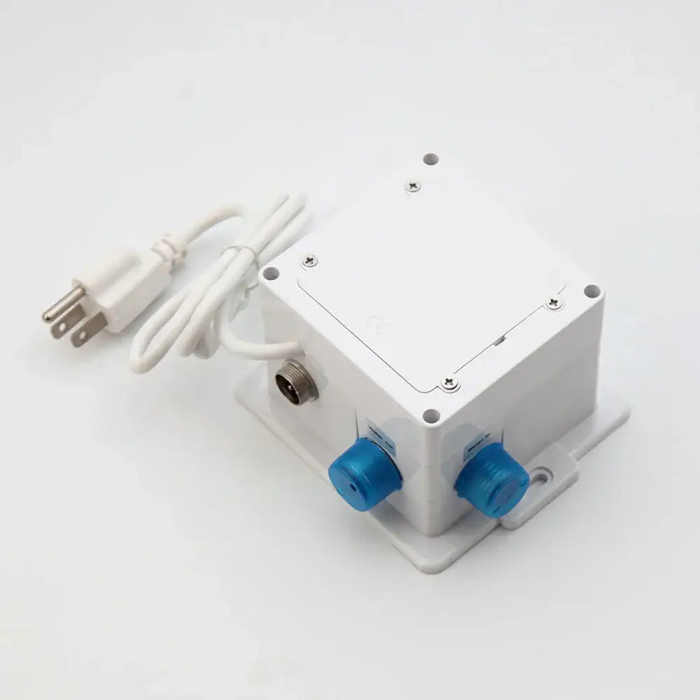 White plastic electrical junction box with blue caps and coiled cord for modern chrome touch sensor bathroom faucet