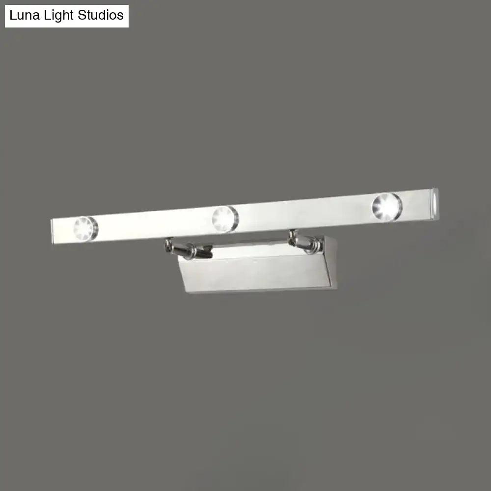 Modern chrome wall light with three adjustable stainless steel shade spotlights for bathroom use