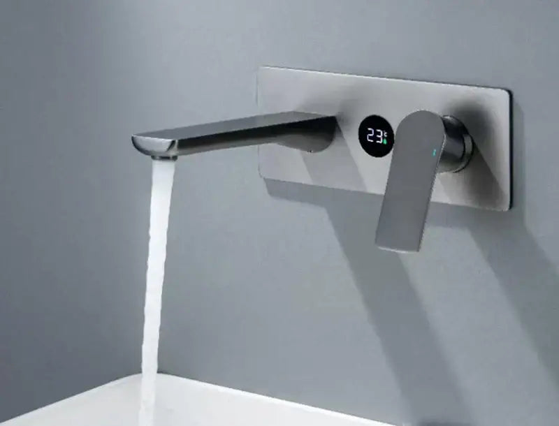 Modern chrome wall mounted basin faucet with brass valve core and digital temperature display in brushed stainless steel
