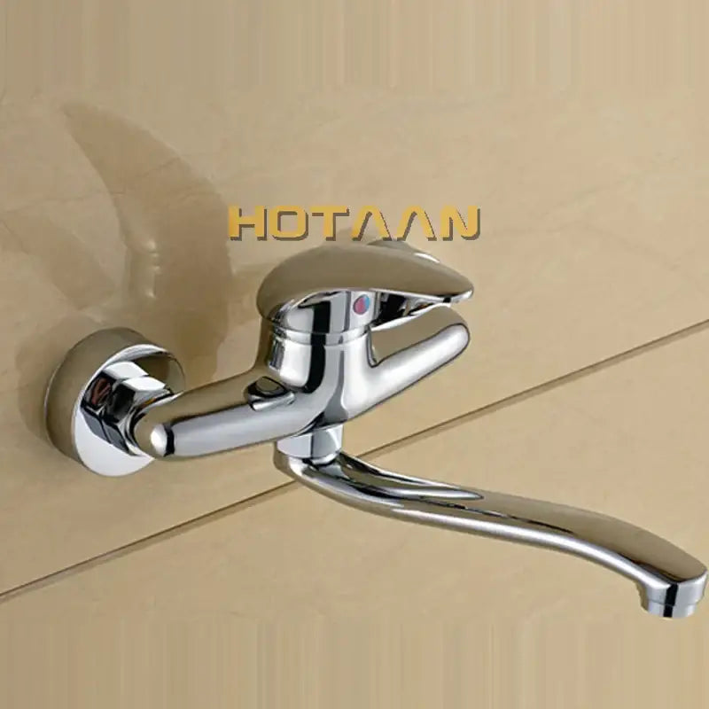 Modern chrome wall mounted kitchen tap with curved spout featuring decorbites brass chrome dual handle design