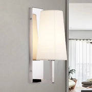 Modern chrome wall sconce light with sleek finish and handmade cone fabric shade for bedroom lighting