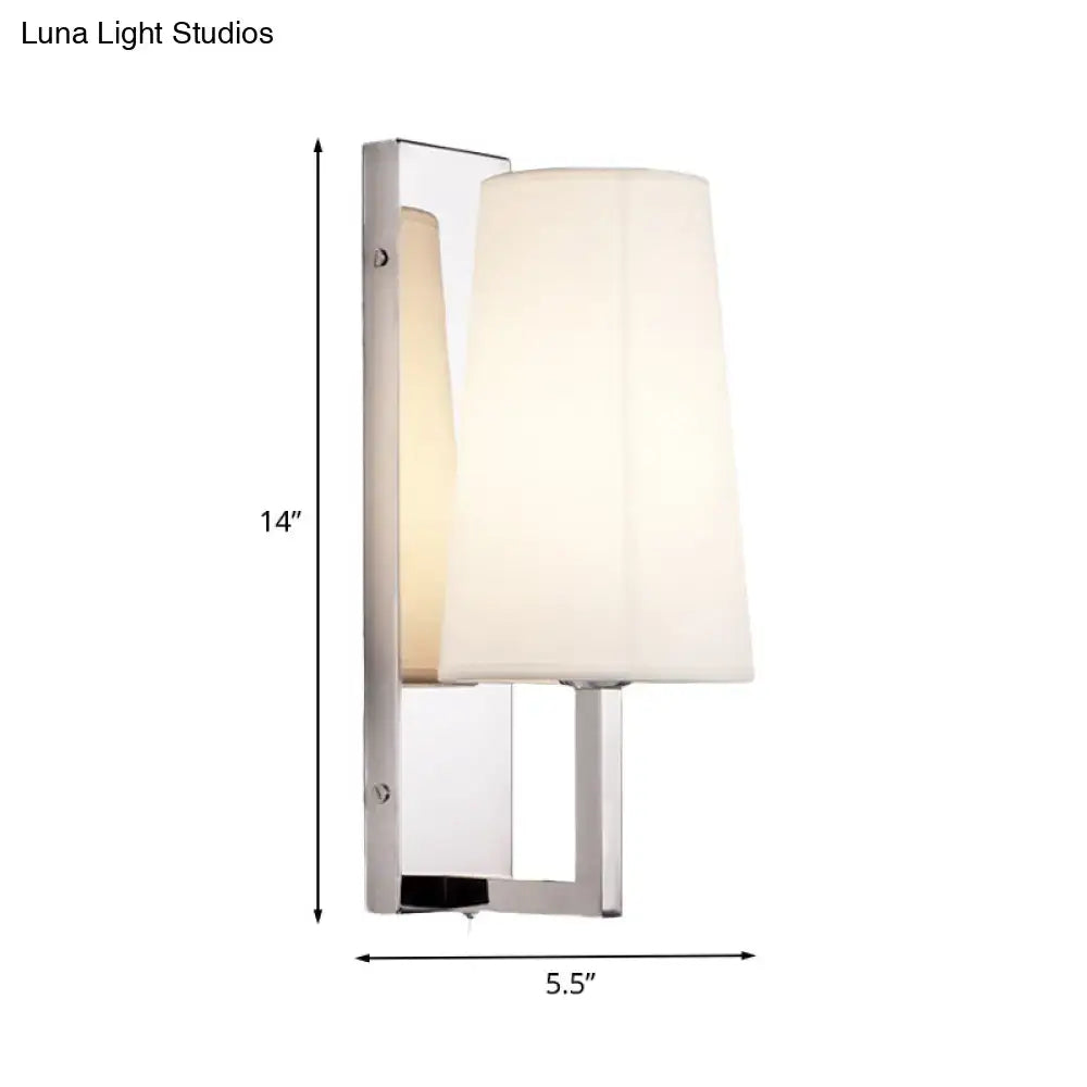 Modern chrome wall sconce light with sleek finish and handmade cone fabric shade for bedroom use