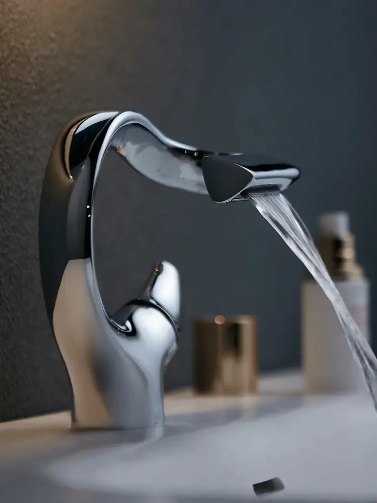 Modern chrome waterfall bathroom faucet single handle mixer tap with sleek curves for single hole cold water use