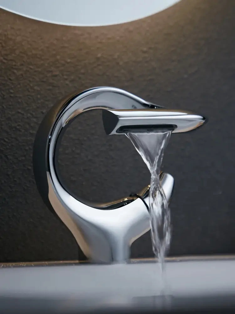 Modern chrome waterfall bathroom faucet single handle mixer tap with sleek curved design for single hole cold water use