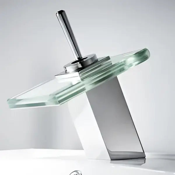 Modern chrome waterfall bathroom faucet with sleek glass waterfall spout and white ceramic basin mixer in chrome finish