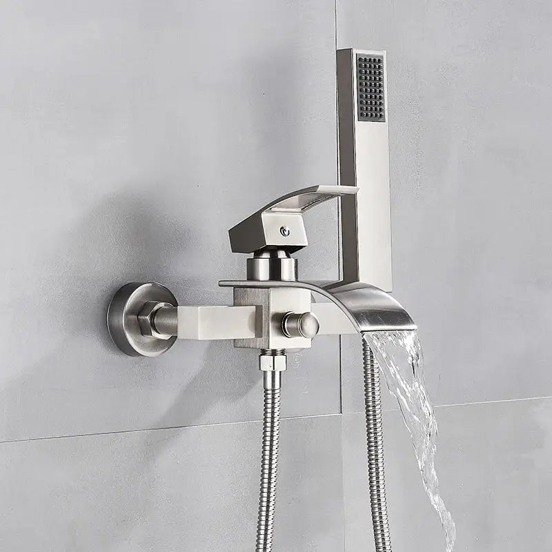 Modern chrome waterfall bathtub shower faucet in brushed stainless steel with sleek angular design and handheld showerhead
