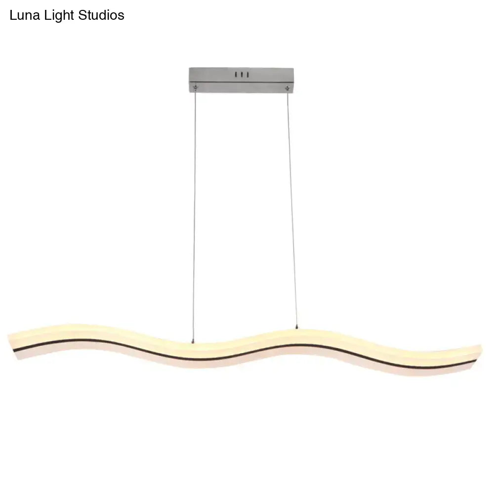 Modern chrome wave island lighting fixture with sleek warm white LED body and brushed metallic ceiling mount in modern style