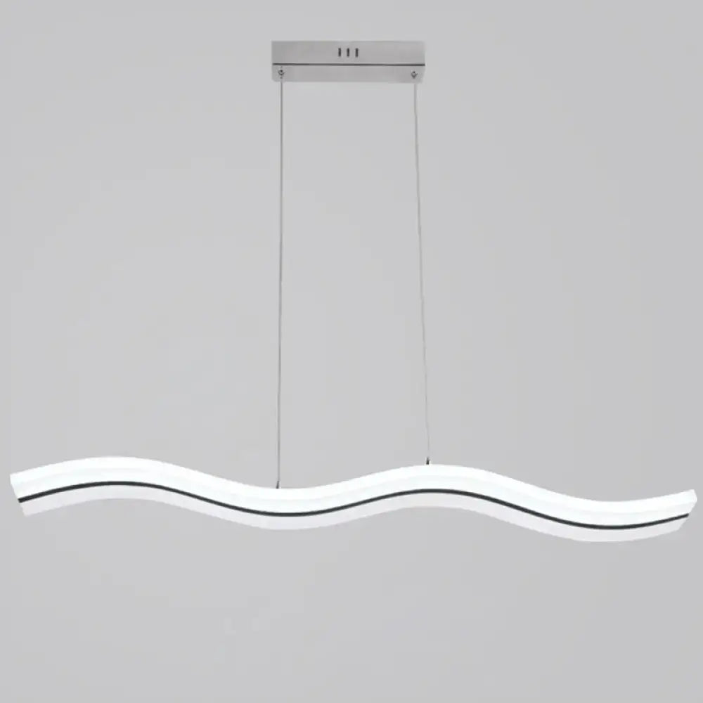 Modern chrome wave led island lighting fixture with a white acrylic body and polished chrome hardware in modern style