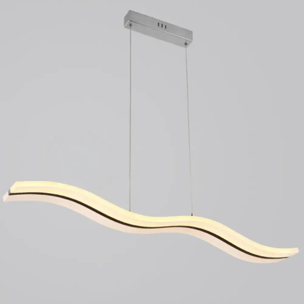 Modern chrome wave led island lighting fixture with sleek chrome finish and warm white illumination for kitchen use