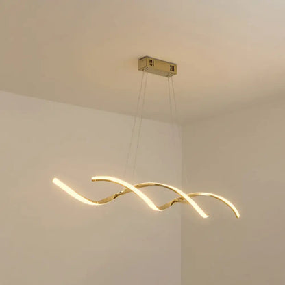 Gold-toned modern led island lighting with three intertwined curved arms for sleek kitchen pendant lighting
