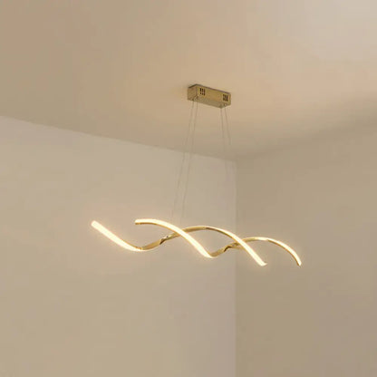 Gold-toned modern chrome wave led island lighting with sleek curved design and warm ambient kitchen pendant light