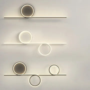 Modern circle straight bar wall lamp with sleek metallic frame and circular led lights for bedroom and living room decorbites circle straight