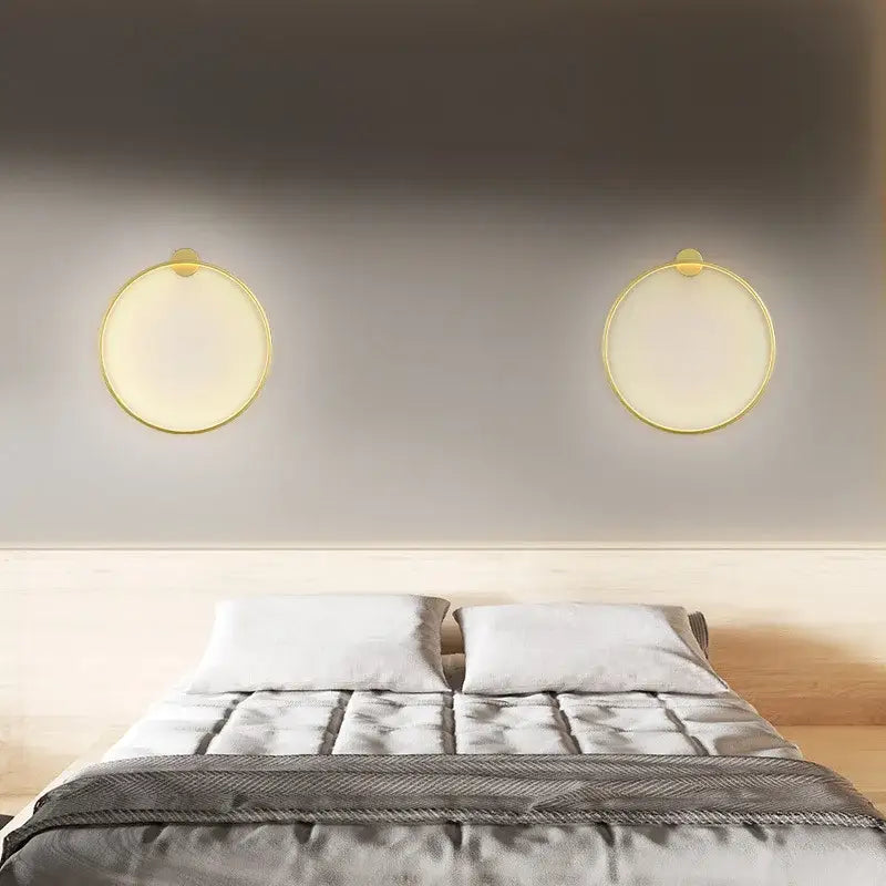Modern circular black led wall lights with gold-rimmed circular design and warm glow for living room decorbites led wall lights