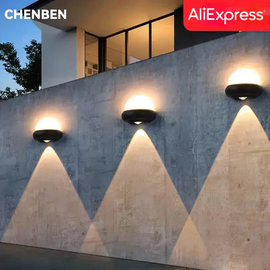 Modern circular black solar led wall light with warm white illumination for garden decorbites led wall light exterior use