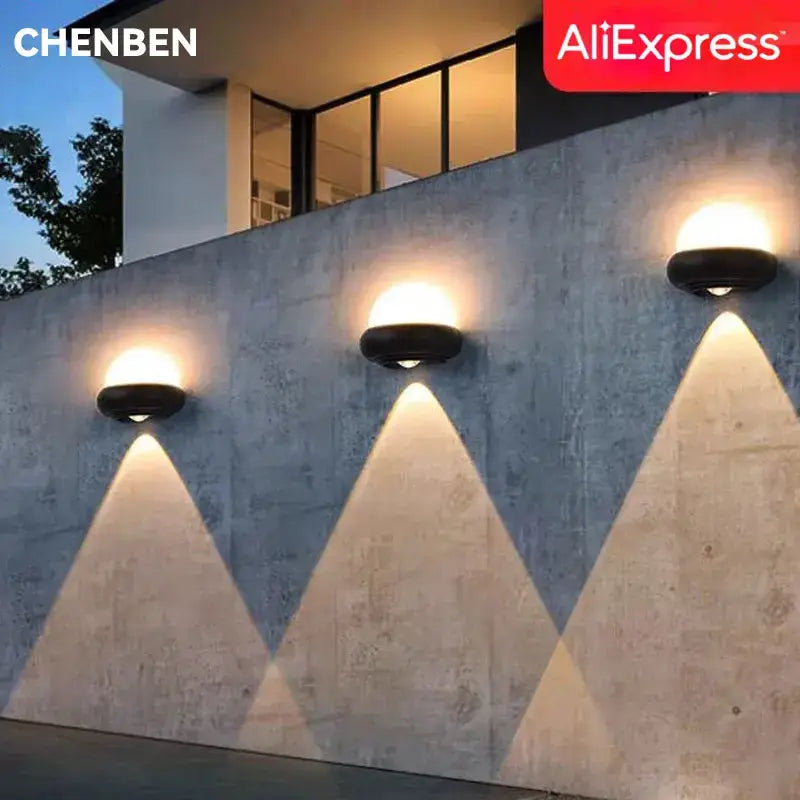Modern circular black solar led wall light with warm white illumination for garden decorbites led wall light exterior use