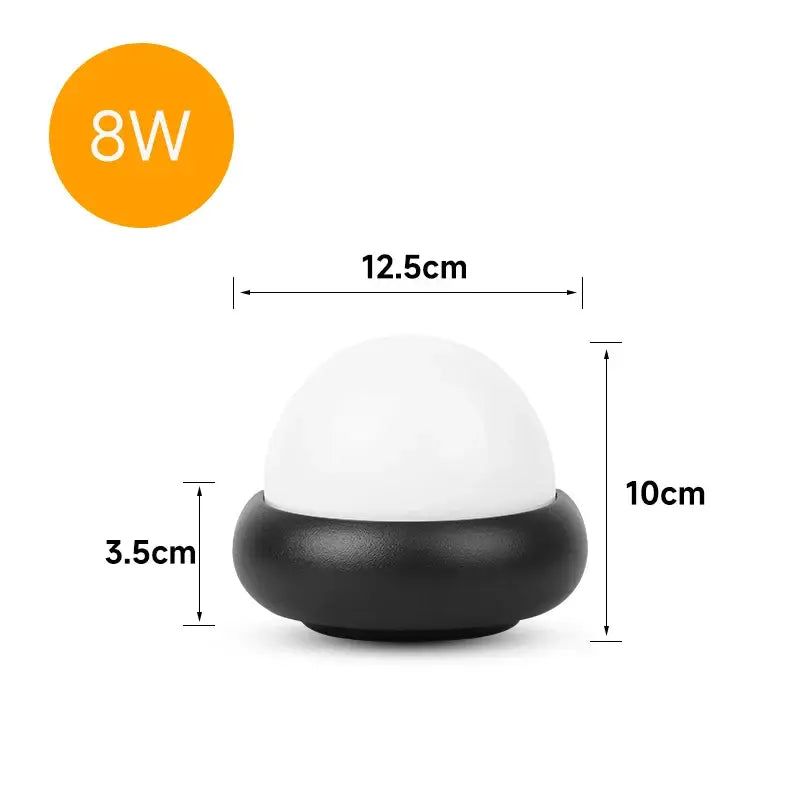 Modern circular black solar led wall light with compact two-toned white dome and black base for garden decorbites led wall use
