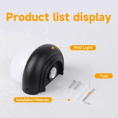 Modern circular black solar wall light with decorbites acrylic led featuring a black plastic mount and white bulb