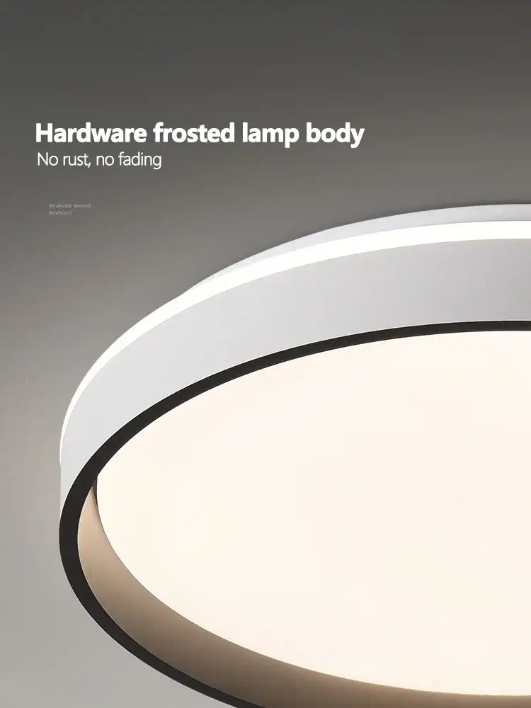 Modern circular black and white led ceiling lamp with sleek white frosted body and black trim for bedroom decorbites ceiling lamp