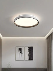 Modern circular black and white led ceiling lamp with sleek frame emitting soft ambient light for bedroom decorbites ceiling lamp