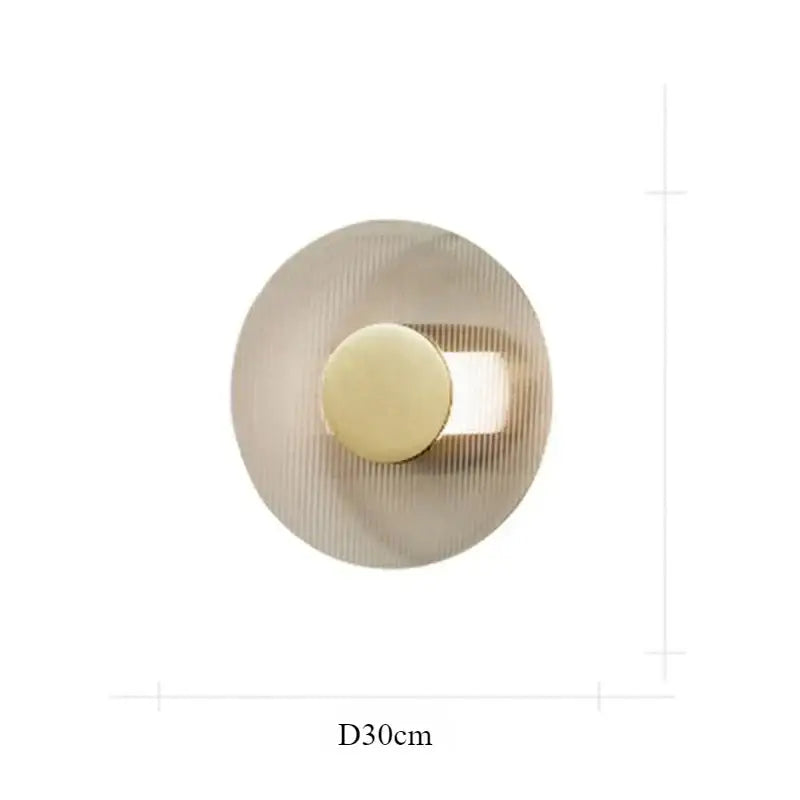 Modern circular brushed metallic wall lamp with concentric ridged texture for elegant glass wall decorbites elegant glass wall use