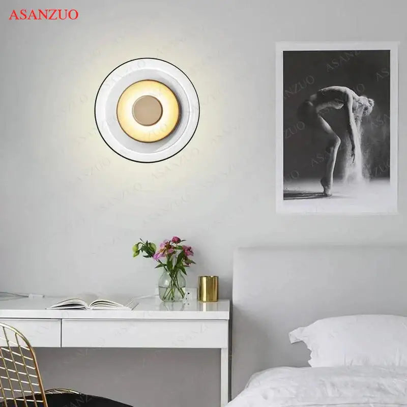 Modern circular glass bowl led wall sconce with sleek white outer ring and warm yellow light for bedroom decorbites decor