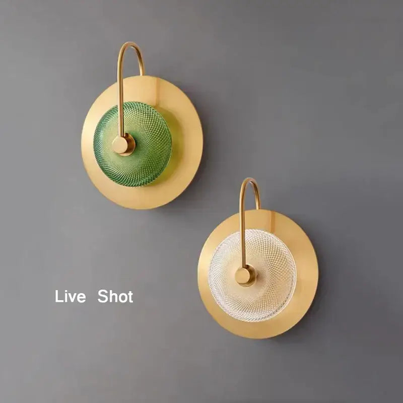 Modern circular green copper wall lamp with two brass sconces featuring green and clear textured glass discs decorbites circular green